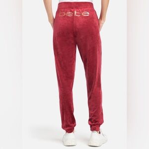 Bebe Red Plush Track Pants with Tapered Legs Size Large NWT